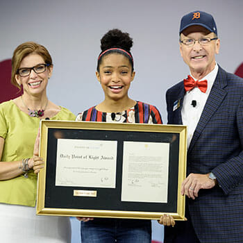 CEO Tracy Hoover and Chairman Neil Bush presented the Daily Point of Light award to Yara Shahidi.