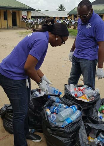 GE volunteers bag recyclables at the Community Boys Secondary School Elelenwo in Port Harcourt, Nigeria.