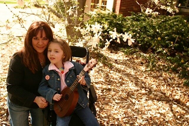 Judy Winter with a budding musician from RicStar's Camp./Courtesy Judy Winter