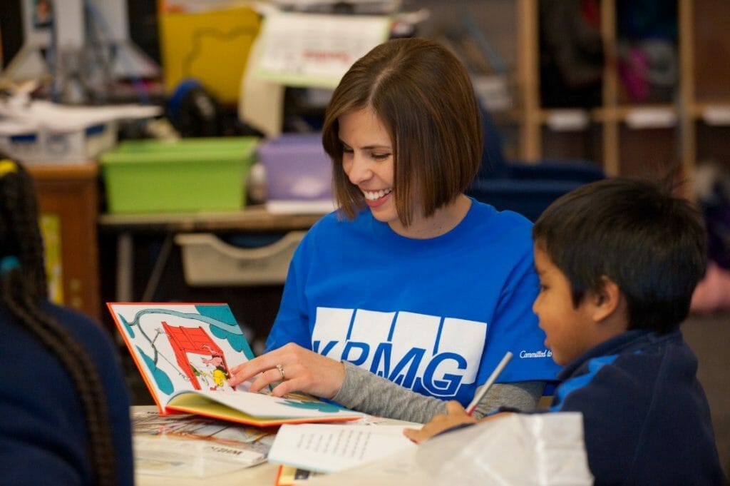 KPMG’s Family for Literacy program gives new books to children in need.