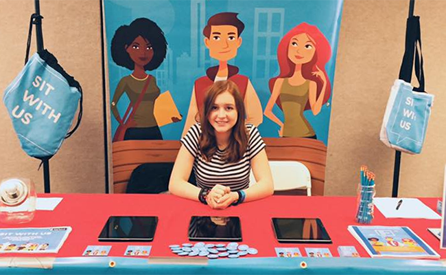 Natalie Hampton created an app called Sit With Us, which allows students to identify themselves as “ambassadors” and create open lunch tables.