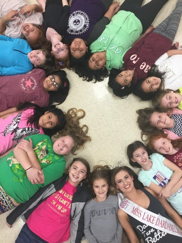 Aubrey (lower right) pictured with students who attend her STEPS dance program./Courtesy Paula Montgomery