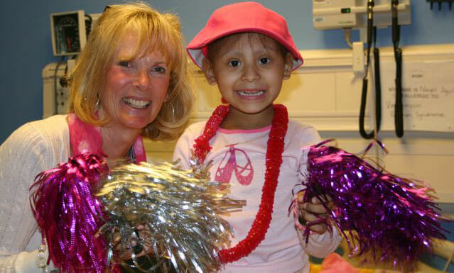 Susan Vincent with a young patient at University of California Los Angeles's Mattel Children's Hospital.