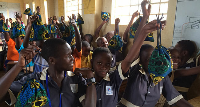 Students at the St. Kizito School, located near Wakiso, Uganda, receiving MoonCatcher kits./Courtesy Ellie von Wellsheim