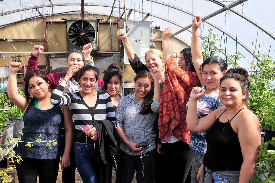 Teen moms from the Sustainable Science class at Yampah Mountain High School celebrate completing a gardening class in the off-campus Sustainability Pod run by Kim Doyle Wille.