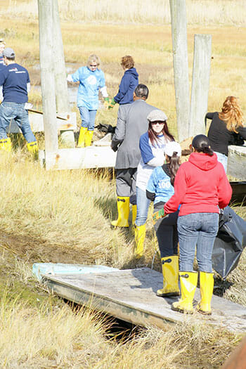 Volunteers participate in clean-up projects on Long Island after Superstorm Sandy.
