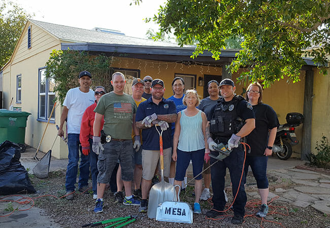 Among the 36 projects taking place in Mesa, Arizona, on Make A Difference Day 2016, volunteers provided yard clean-up and debris removal to elderly and low-income residents.
