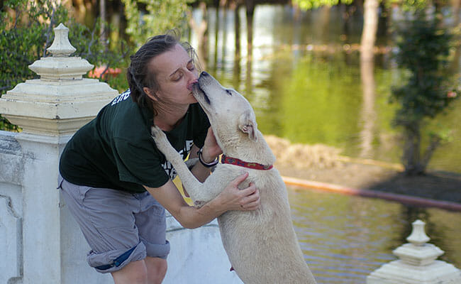 Cheri Deatsch with a dog she rescued when Thailand experienced severe flooding during the 2011 monsoon season.