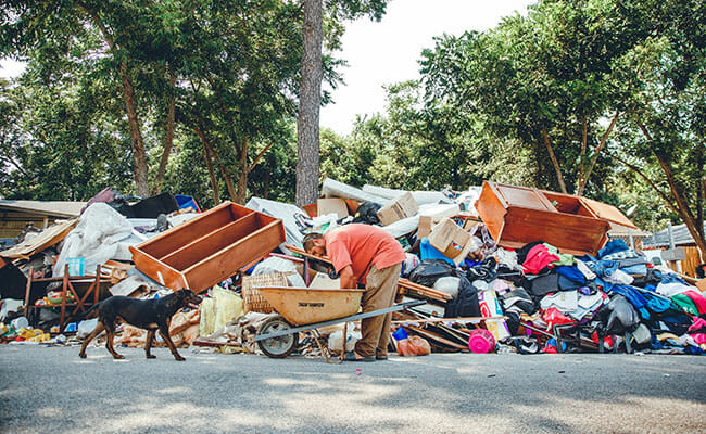 Debris and household items removed from mucked homes by Recovery Houston volunteers.