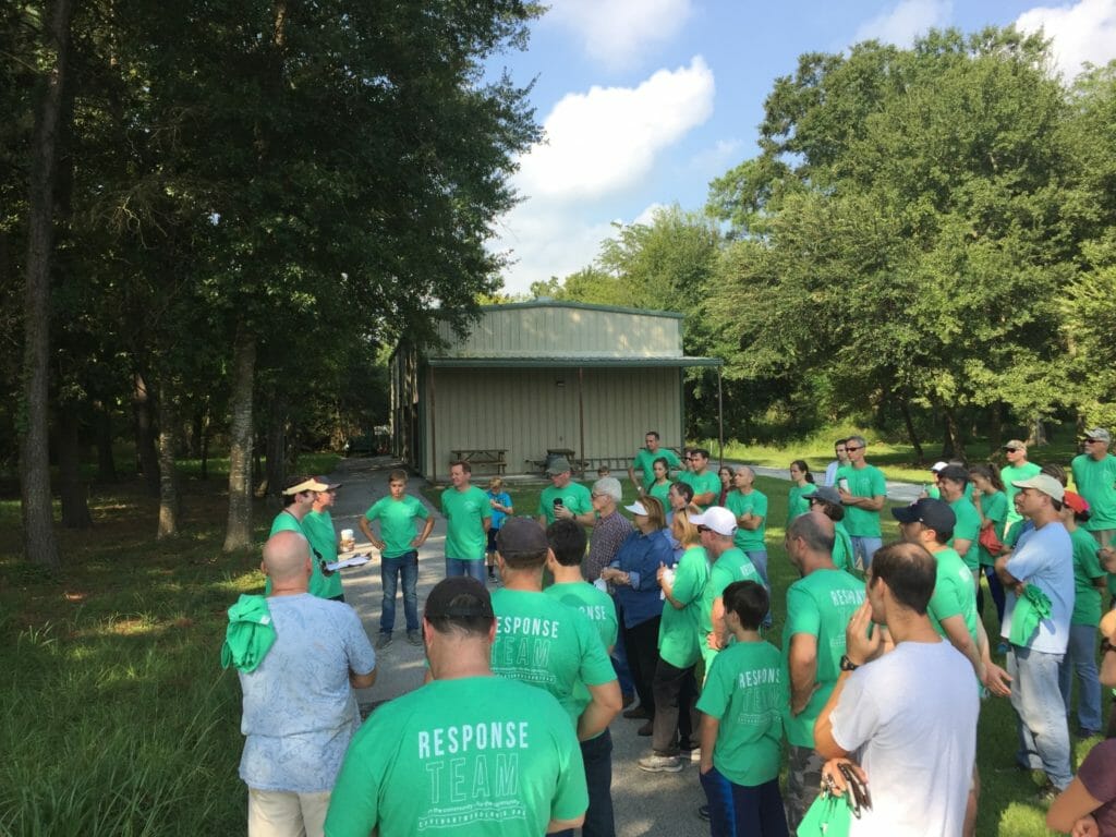 Bryan speaks to volunteers during a work and safety briefing before the sixth day of recovery efforts begin./Courtesy Bryan Grant