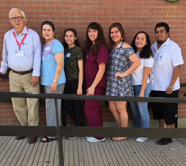 Ronald Weaver (far left) with Julia’s Center for Healthcare Spanish speaking interpreters, many of whom he recruited./Courtesy Ronald Weaver