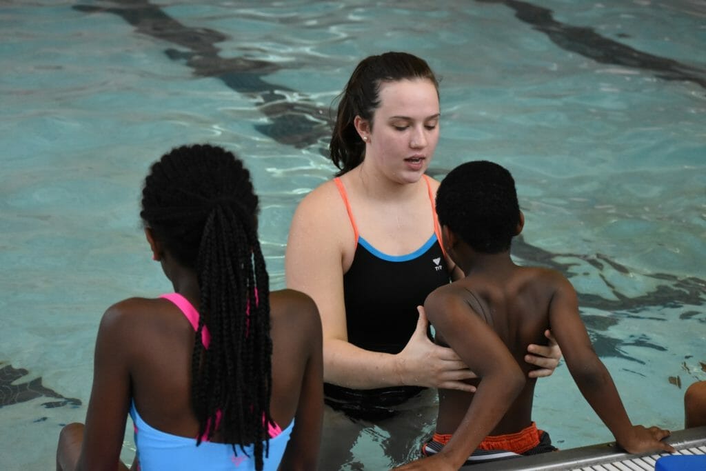 Kate Prager (center) teaching water safety classes at the West Cabarrus YMCA./Courtesy Kate Prager