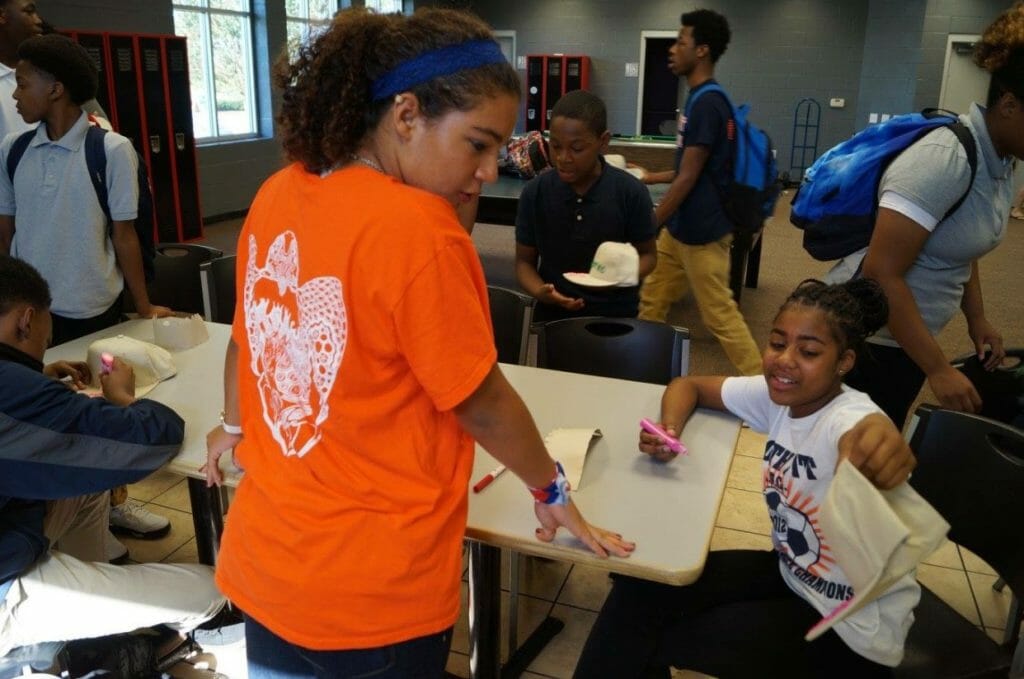 Makayla Harris (center) visiting youth at the Boys and Girls Club in Winterville, N.C. as part of generationOn's Rules of Kindness campaign./Courtesy Makayla Harris