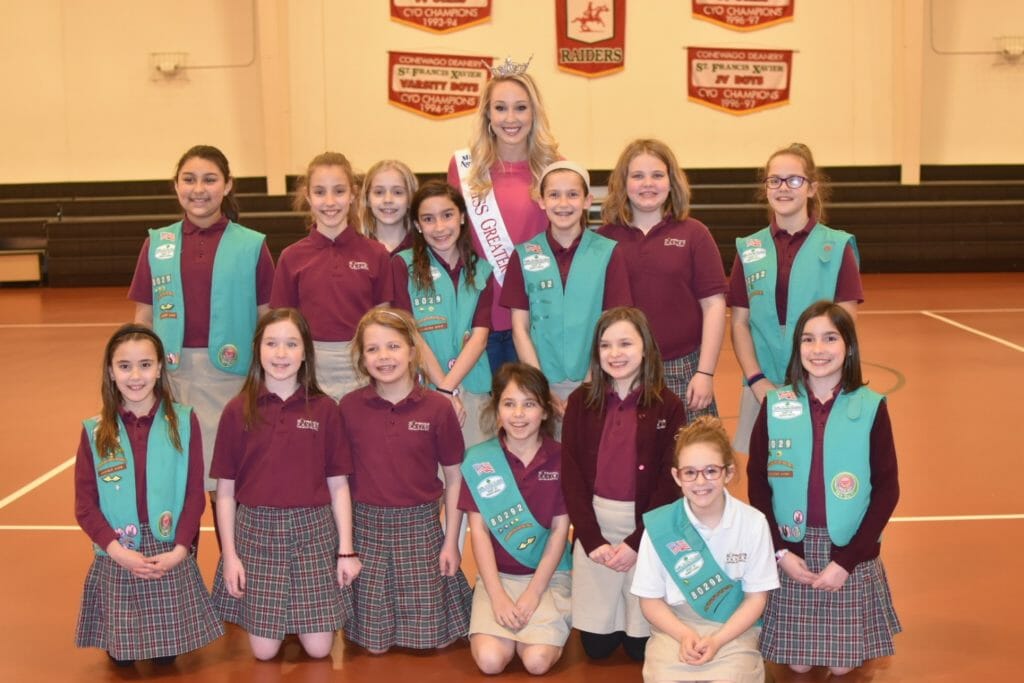 Kayla Repasky with the Girl Scouts of Saint Francis Xavier, who earned her Think Before You Post Patch. /Courtesy Kayla Repasky