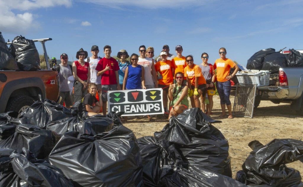  Volunteers at one of the many cleanups at Kahuku. /Courtesy Edgar Espero)