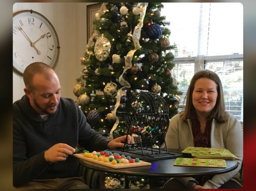 Stephen Roe and Shannon Falon hosting a game of BINGO at Providence Care during the holidays./ Courtesy Amy Howard 