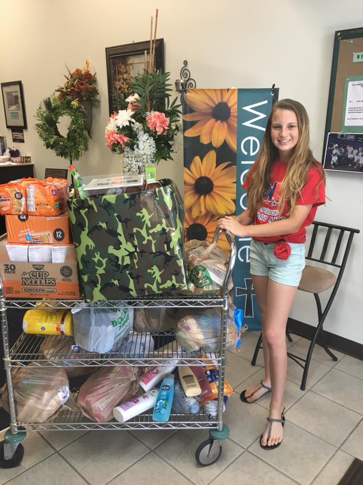 Graci collecting items for care packages at one of the donation locations./Courtesy Graci Tubbs