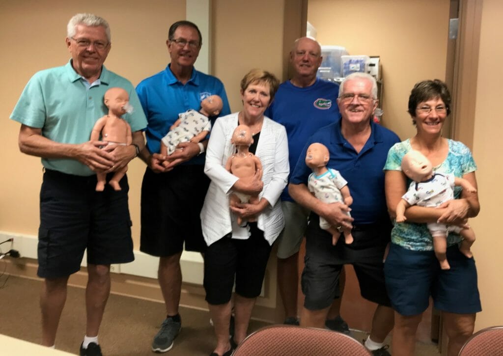 From Left, Mark Willman, Jeff Wilson, Dean Wilson, Bob Duvall, Billy Lacasse- whose life was saved in March, and Linda Caso completing their retraining in CPR and AED use, including for infants and the Heimlich maneuver./ courtesy Jeff Wilson 