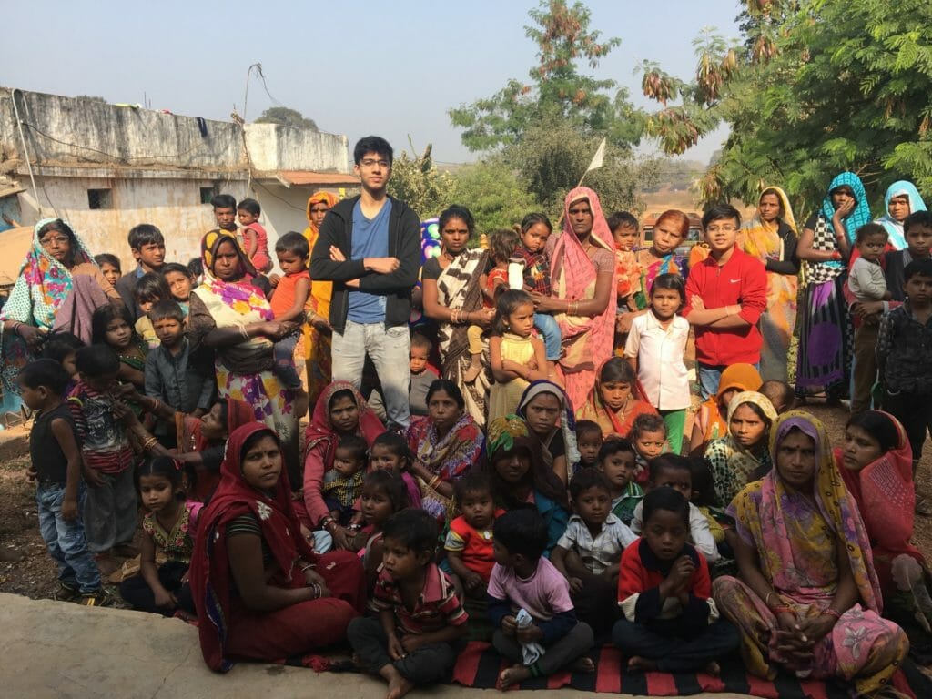 Ansh meets with villagers after an awareness talk about the importance of personal hygiene. /Courtesy Ansh Jain