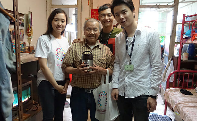 HandsOn Hong Kong volunteers spend time with seniors and deliver homemade soup through the Soup for the Elderly program.. 