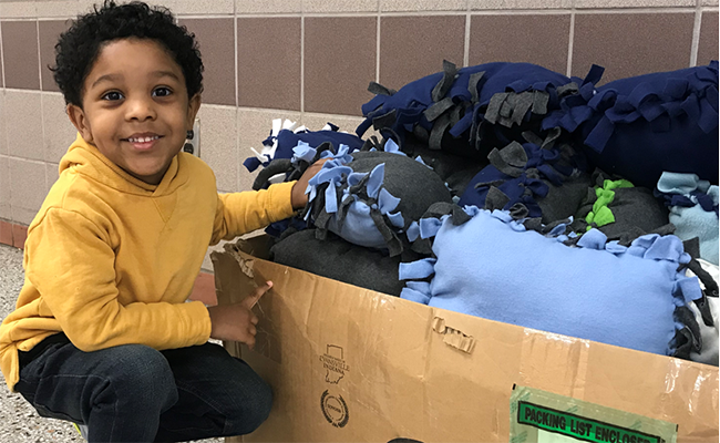 Jersey Cares youth volunteer creates comfort kits for children in need.