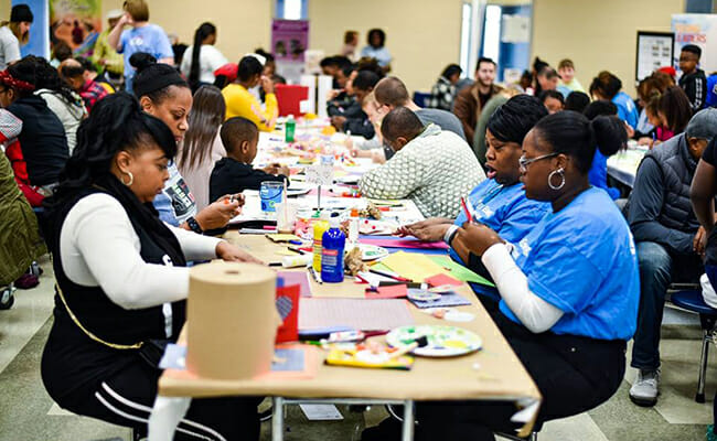 Volunteers create cards of encouragement with United Way of Central Carolinas.