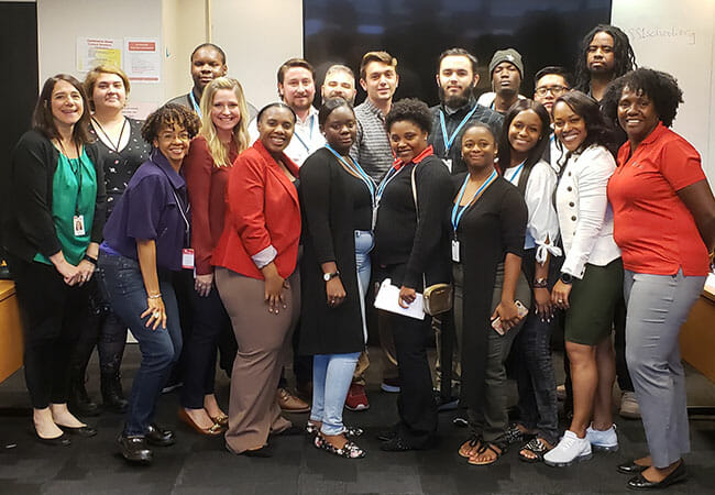 Tranetta Luque (first row, third from left) and Nichelle Johnson (first row, third from right), with fellow participants of the Entergy Career Pathways program, and Entergy project team members.