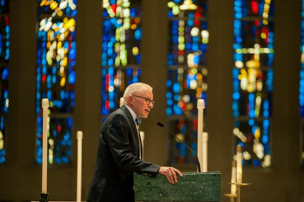Stan Zerkowski addressing an interfaith and civic crowd in 2018 at United in a Voice for the Children, an Encounter designed to draw attention and work for migrant children detained at the border./Courtesy Stan "JR" Zerkowski