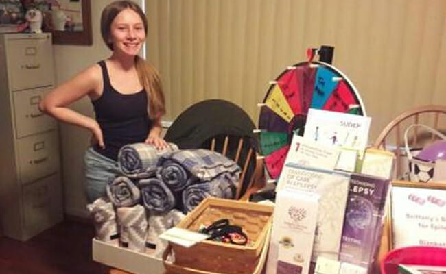15-year-old Brittany VanHook prepares blankets to be donated to kids in need through her nonprofit, Brittany's Blankets for Epilepsy. 