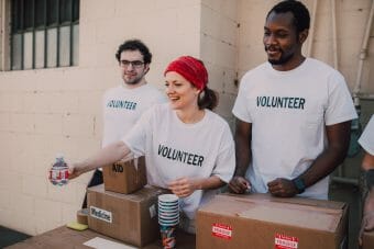 Group of volunteers handing out supplies